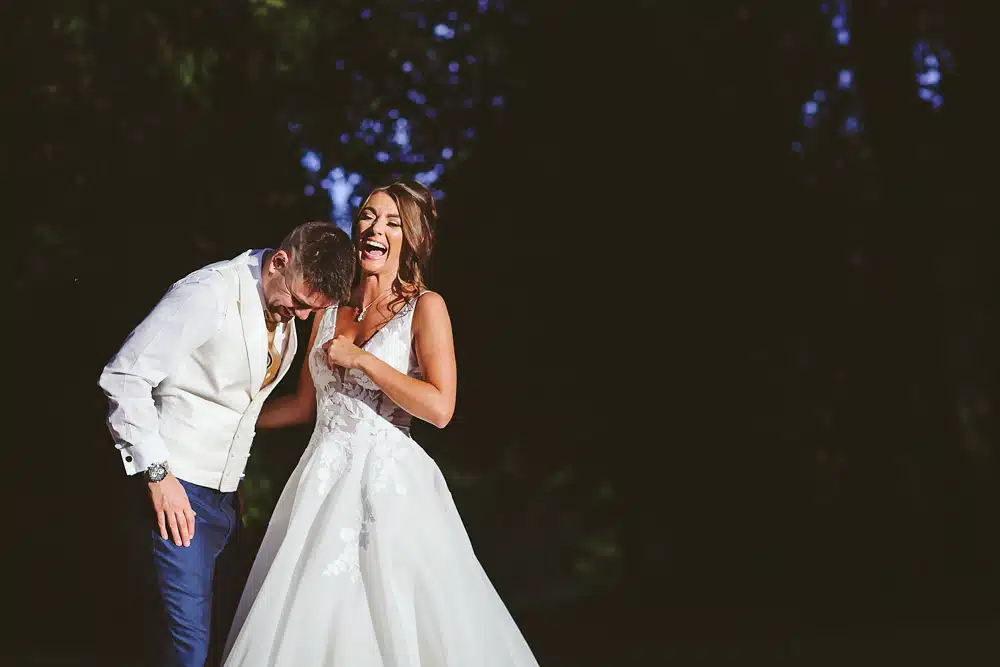 Bride & groom laughing